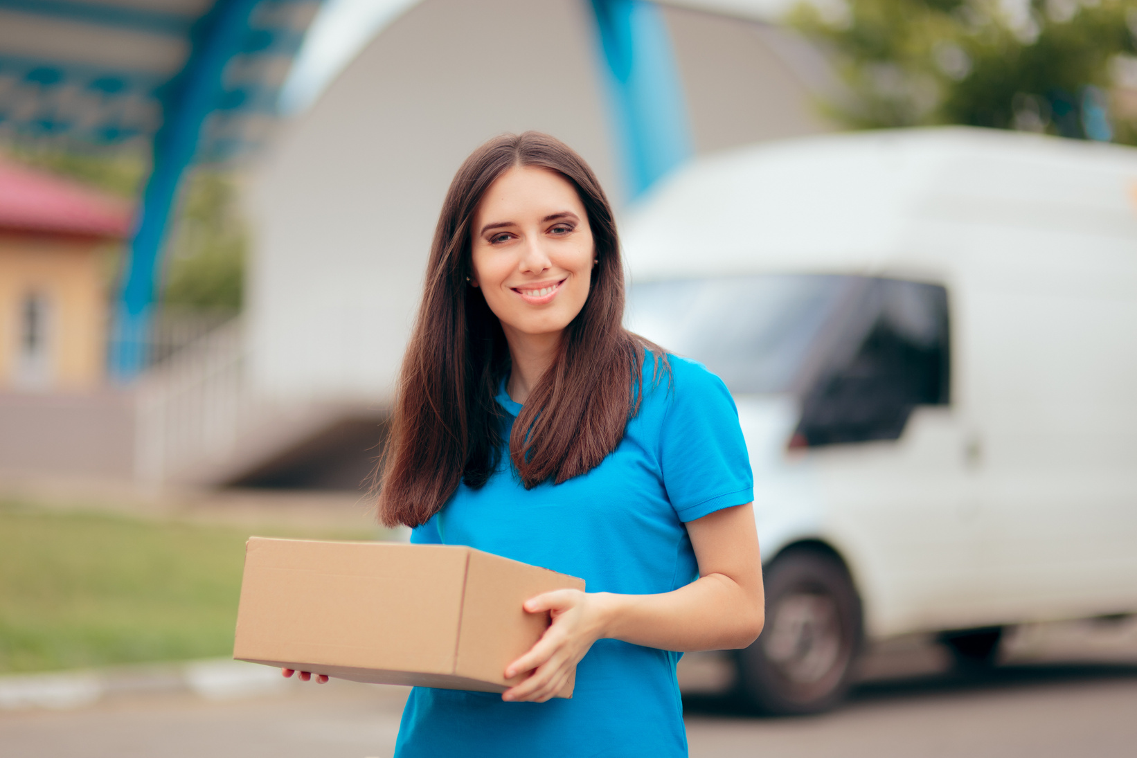 Woman Receiving a Package with Free Shipping Courier Delivery